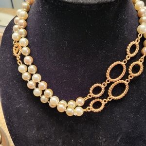 White and gray tone pearl long strand necklace with gold accents.